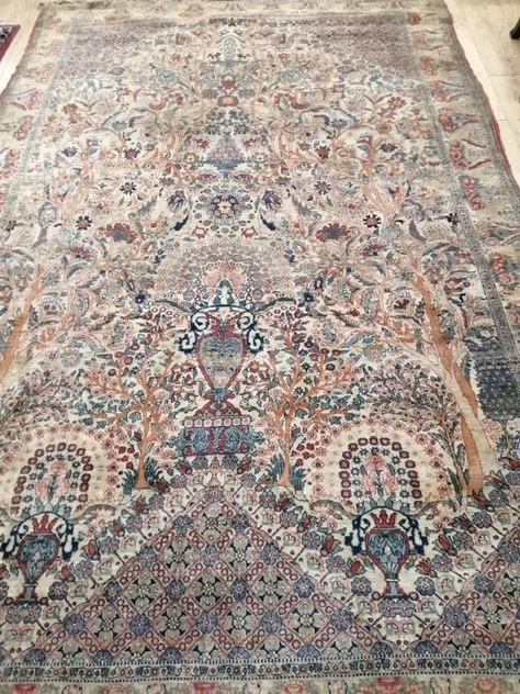 A Persian ivory ground tree of life carpet 210 x 310cm